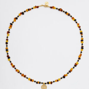 Naszyjnik z bursztynem i ażurową rozetą